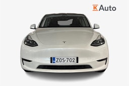 valkoinen Tesla Model Y 2023 kuva 4.