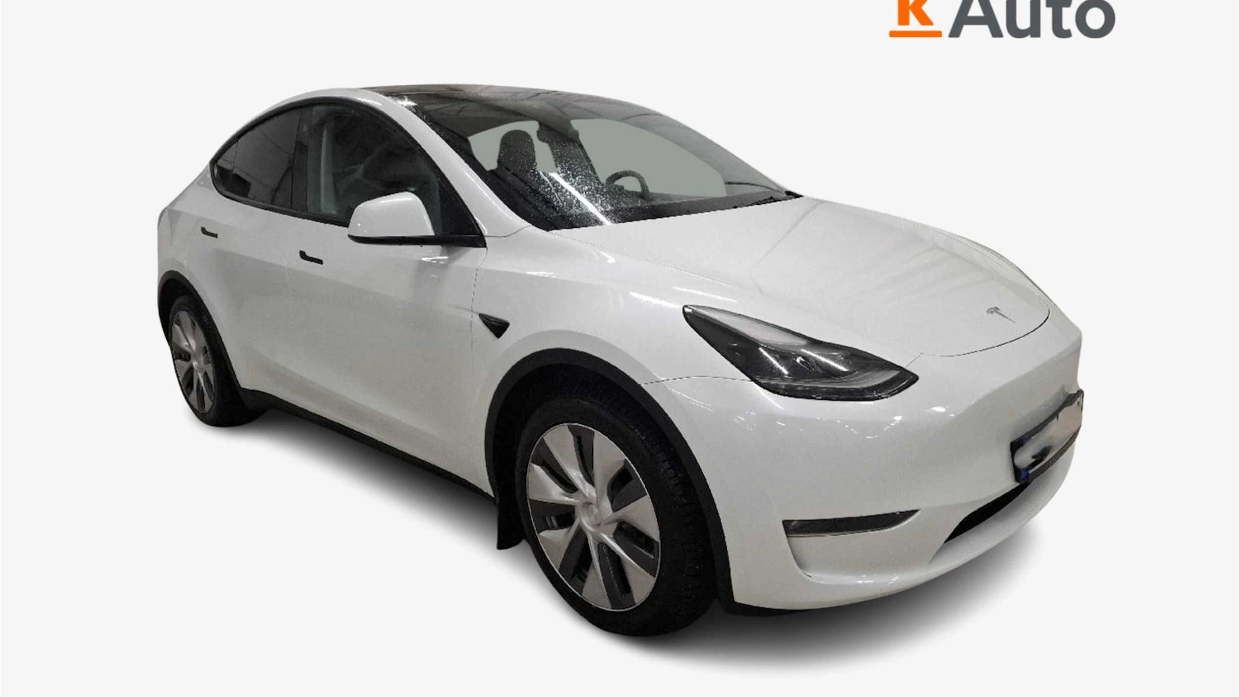 met. valkoinen Tesla Model Y 2024 kuva 1.