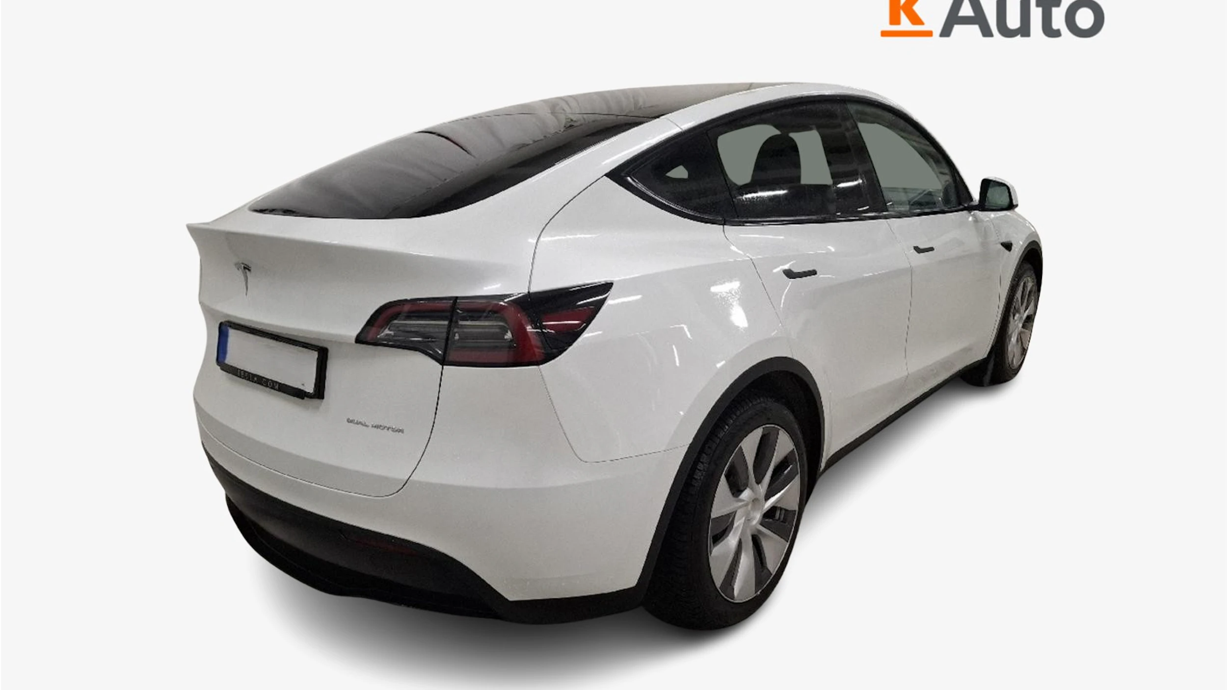 met. valkoinen Tesla Model Y 2024 kuva 2.