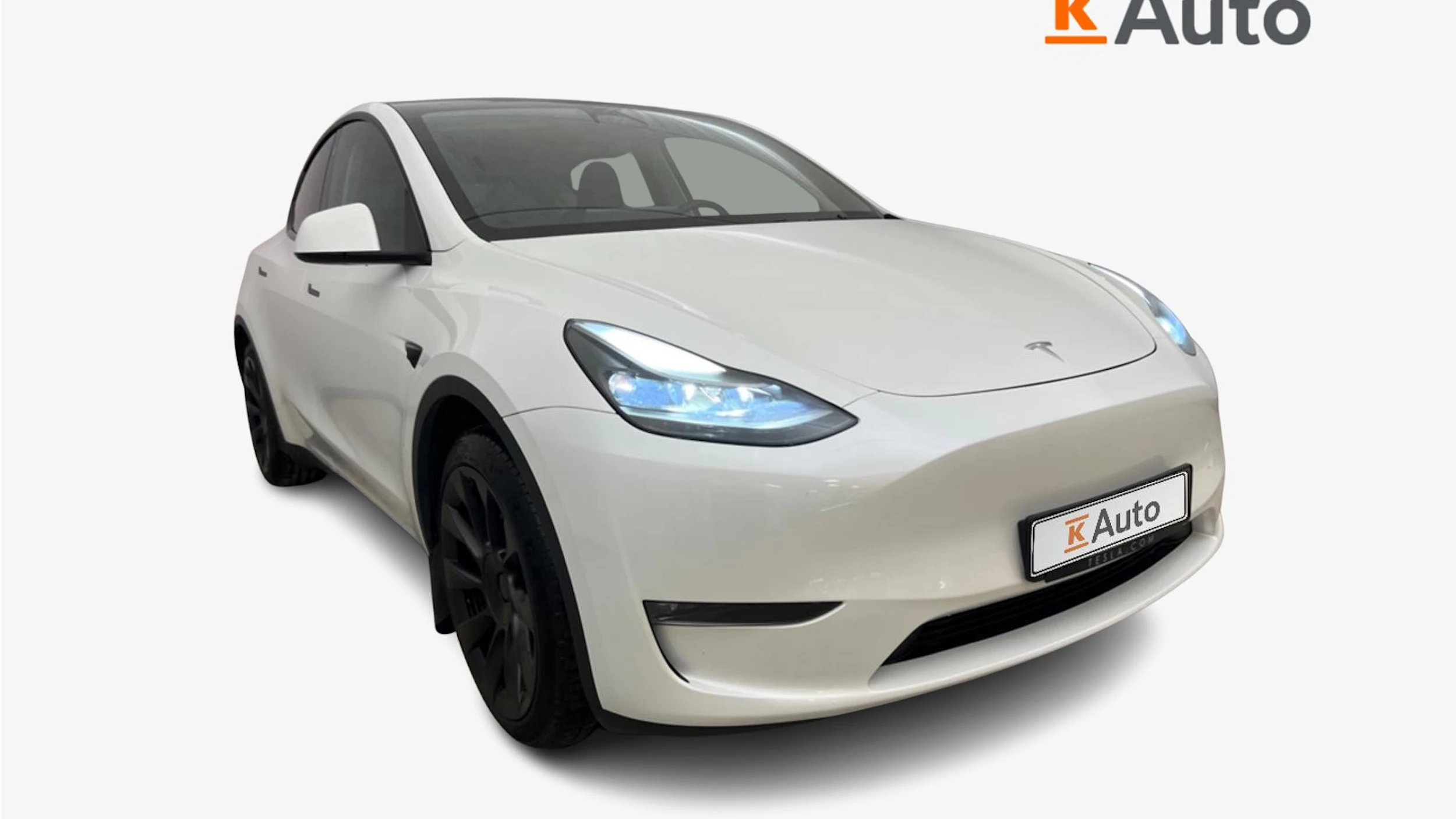 met. valkoinen Tesla Model Y 2024 kuva 1.