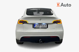 valkoinen Tesla Model Y 2024 kuva 4.