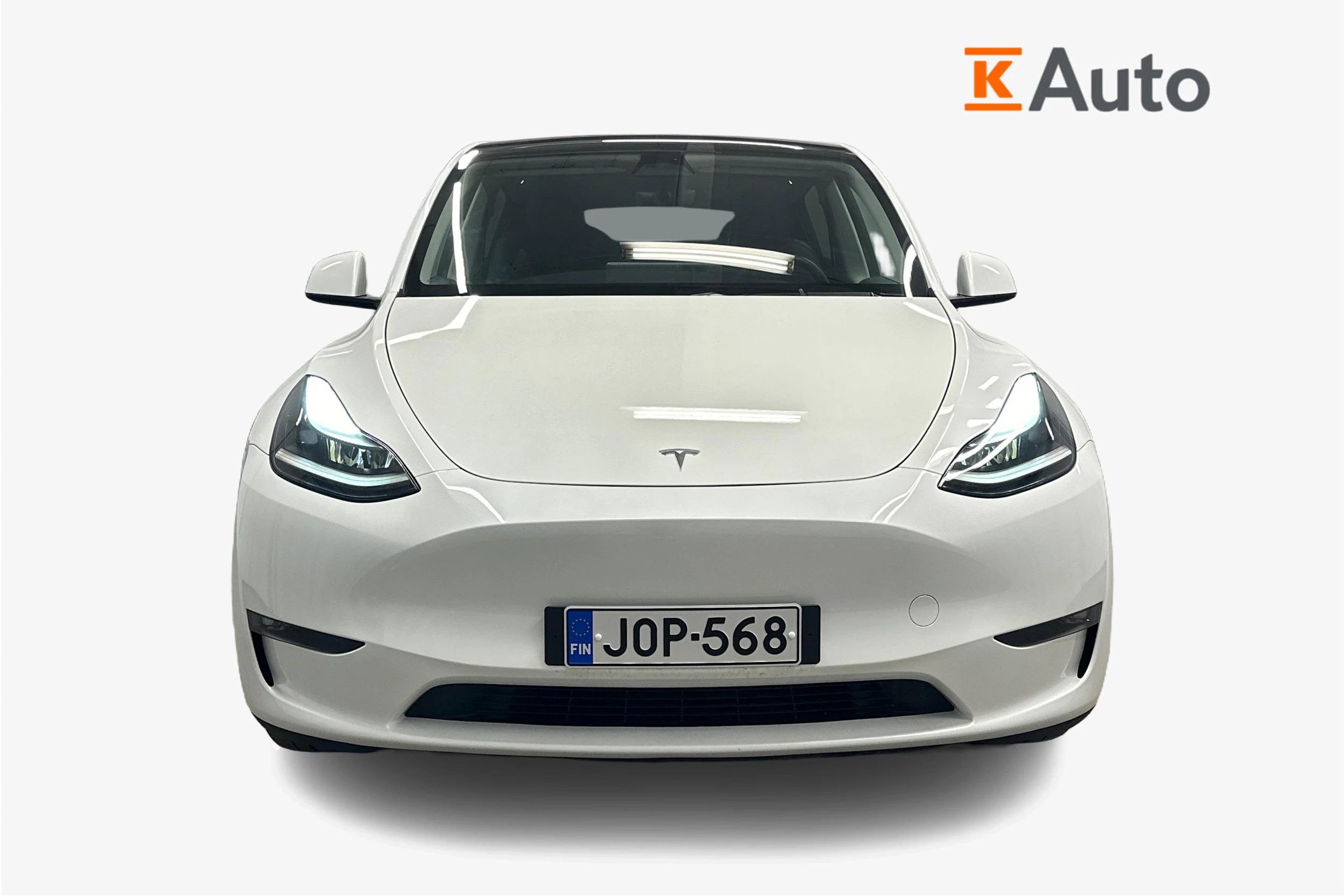 valkoinen Tesla Model Y 2024 kuva 5.