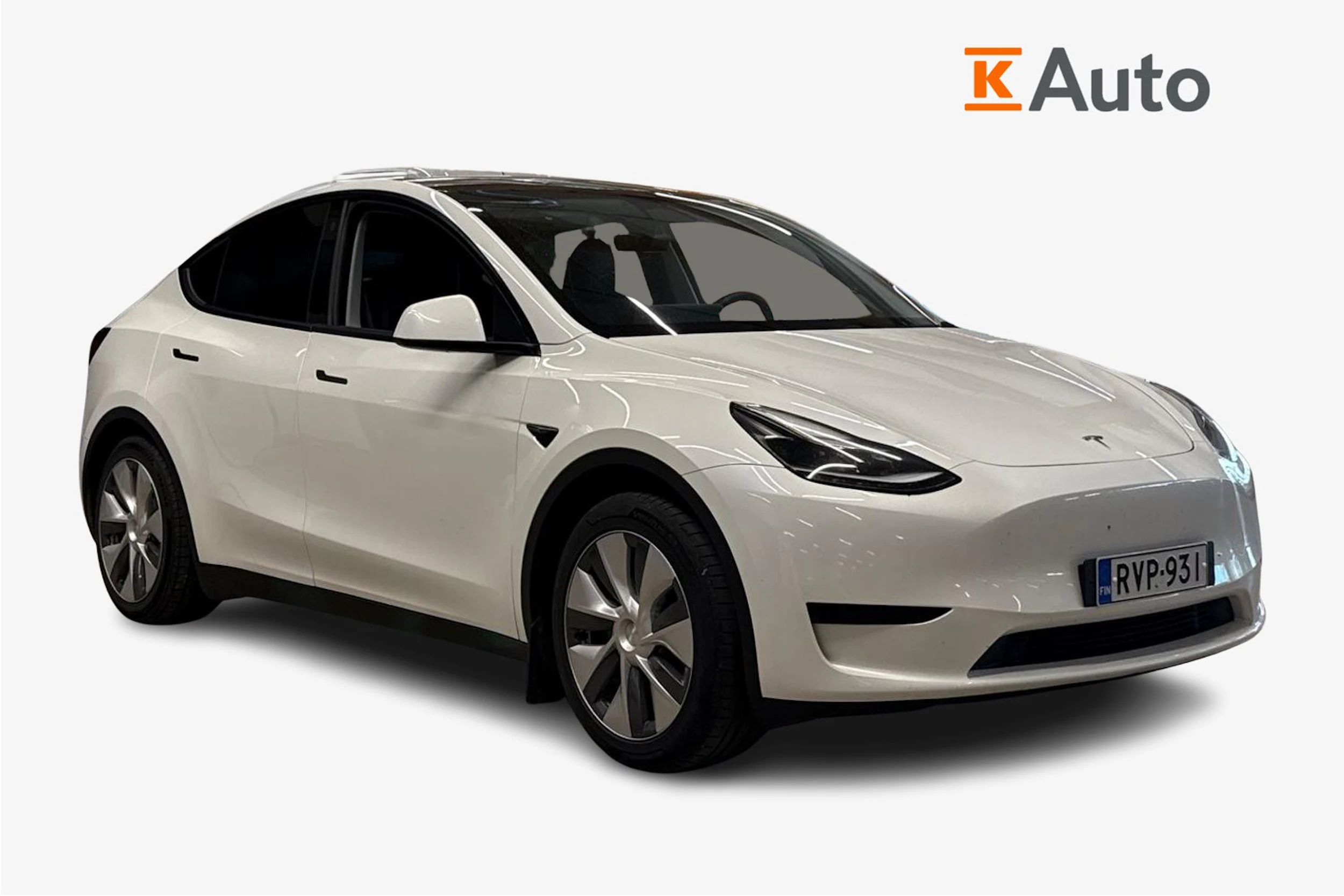 valkoinen Tesla Model Y 2024 kuva 1.