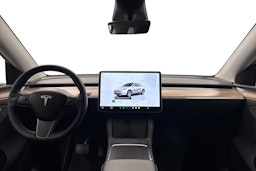 valkoinen Tesla Model Y 2024 kuva 9.