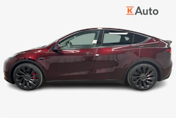 punainen Tesla Model Y 2024 kuva 5.
