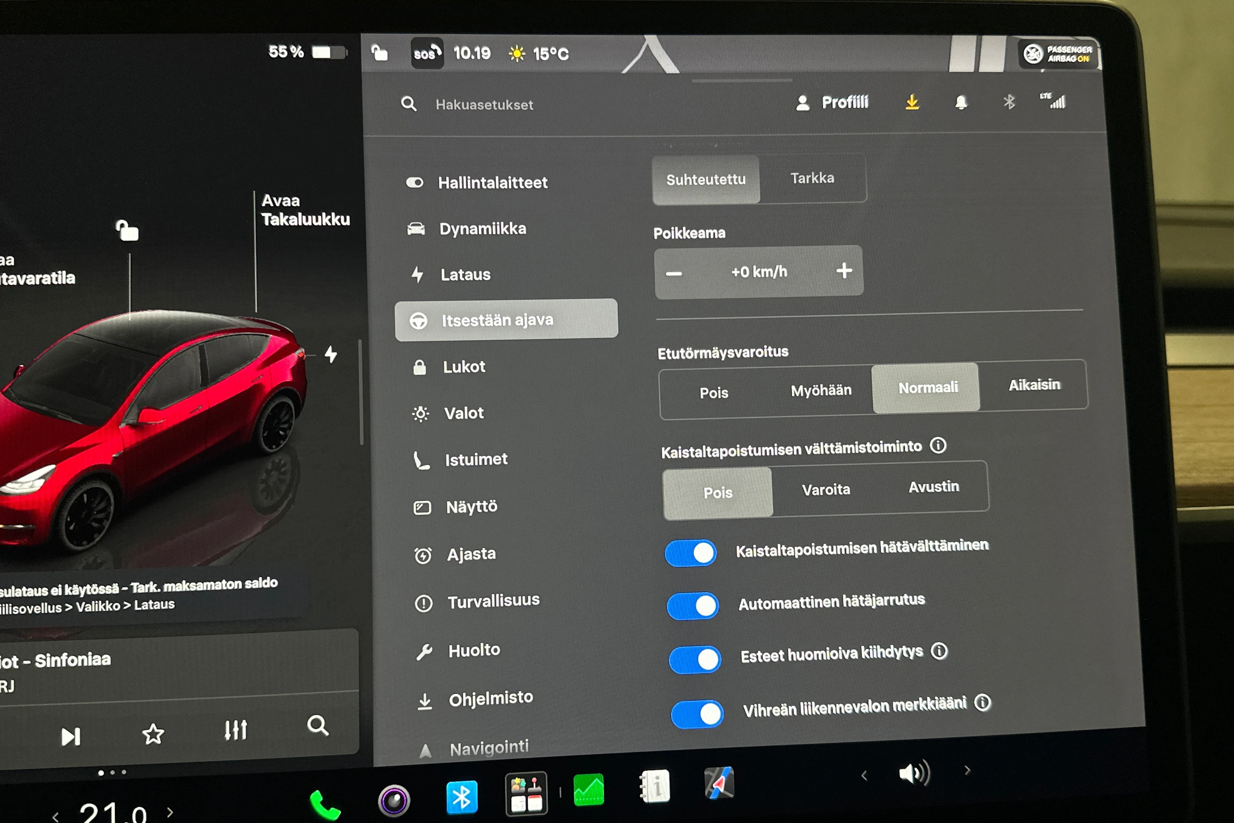 punainen Tesla Model Y 2024 kuva 21.