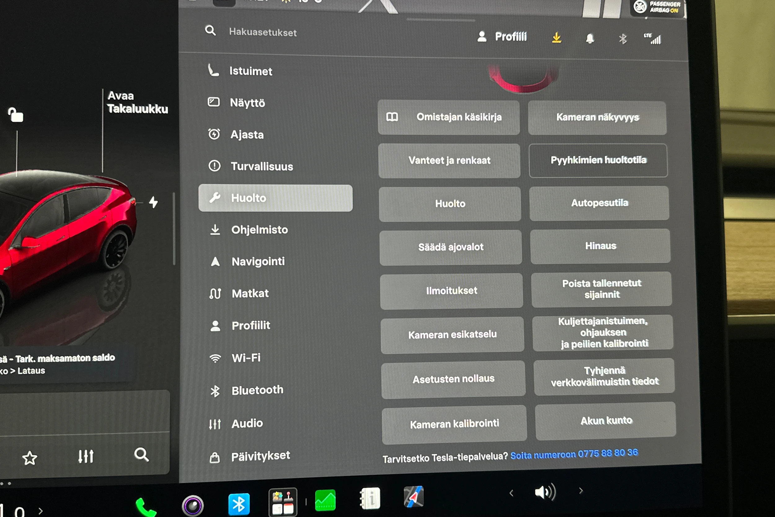 punainen Tesla Model Y 2024 kuva 23.