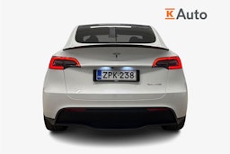 valkoinen Tesla Model Y 2024 kuva 3.