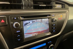 met. punainen Toyota Auris 2013 kuva 16.