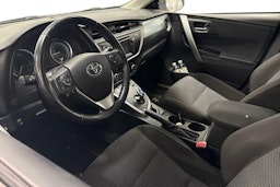 valkoinen Toyota Auris 2014 kuva 3.