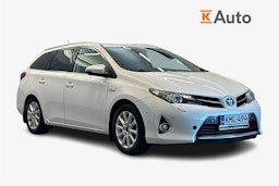 valkoinen Toyota Auris 2014 kuva 1.