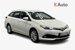 valkoinen Toyota Auris 2015 kuva 1.