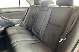 punainen Toyota Avensis 2008 kuva 10.