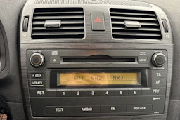 punainen Toyota Avensis 2009 kuva 14.