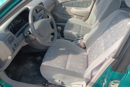 Vihreä Toyota Corolla 1998 kuva 3.