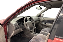 punainen Toyota Corolla 1998 kuva 6.