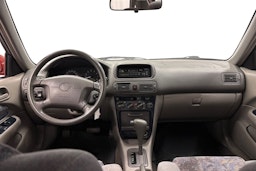 punainen Toyota Corolla 1998 kuva 7.