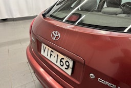 punainen Toyota Corolla 1998 kuva 13.
