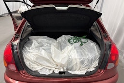 punainen Toyota Corolla 1998 kuva 20.