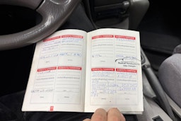 punainen Toyota Corolla 1998 kuva 31.