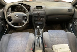 punainen Toyota Corolla 2000 kuva 7.