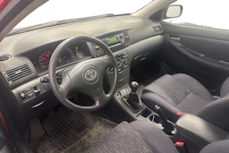 punainen Toyota Corolla 2002 kuva 6.