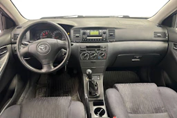 punainen Toyota Corolla 2002 kuva 7.