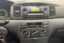 punainen Toyota Corolla 2002 kuva 14.