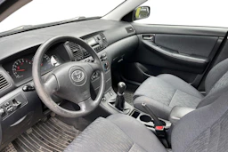 punainen Toyota Corolla 2003 kuva 3.