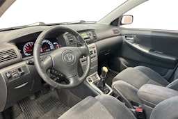 punainen Toyota Corolla 2003 kuva 7.