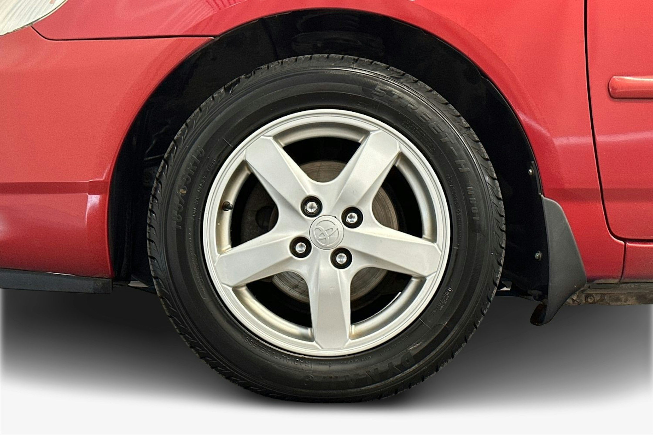 punainen Toyota Corolla 2003 kuva 11.