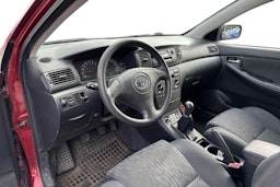 punainen Toyota Corolla 2004 kuva 3.