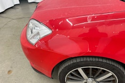 Punainen Toyota Corolla 2004 kuva 14.