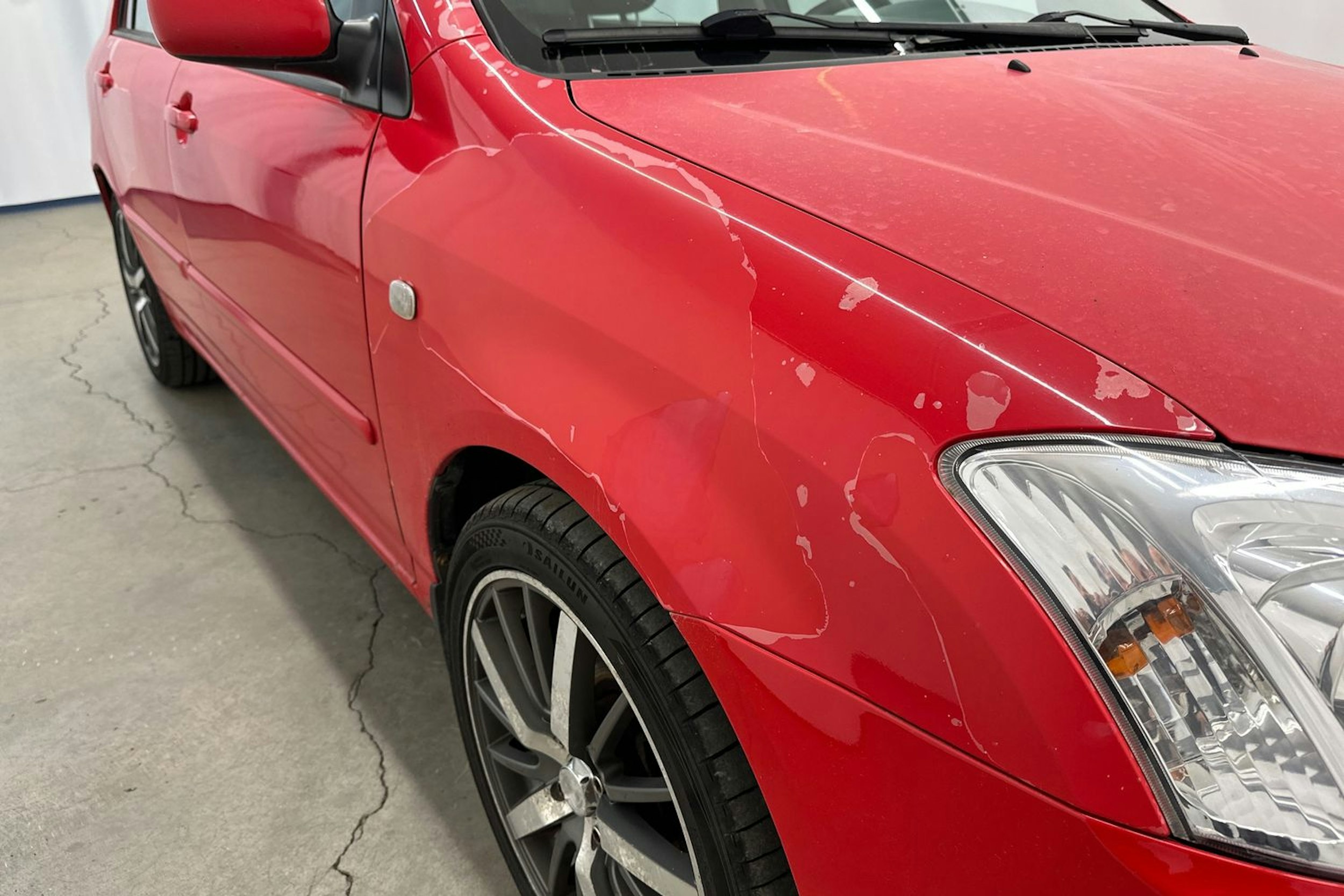 Punainen Toyota Corolla 2004 kuva 16.