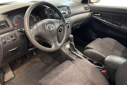 punainen Toyota Corolla 2004 kuva 7.