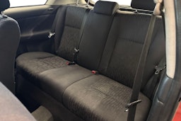 punainen Toyota Corolla 2004 kuva 10.