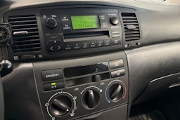 punainen Toyota Corolla 2004 kuva 23.