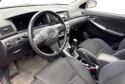 punainen Toyota Corolla 2005 kuva 3.