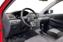 punainen Toyota Corolla 2006 kuva 7.