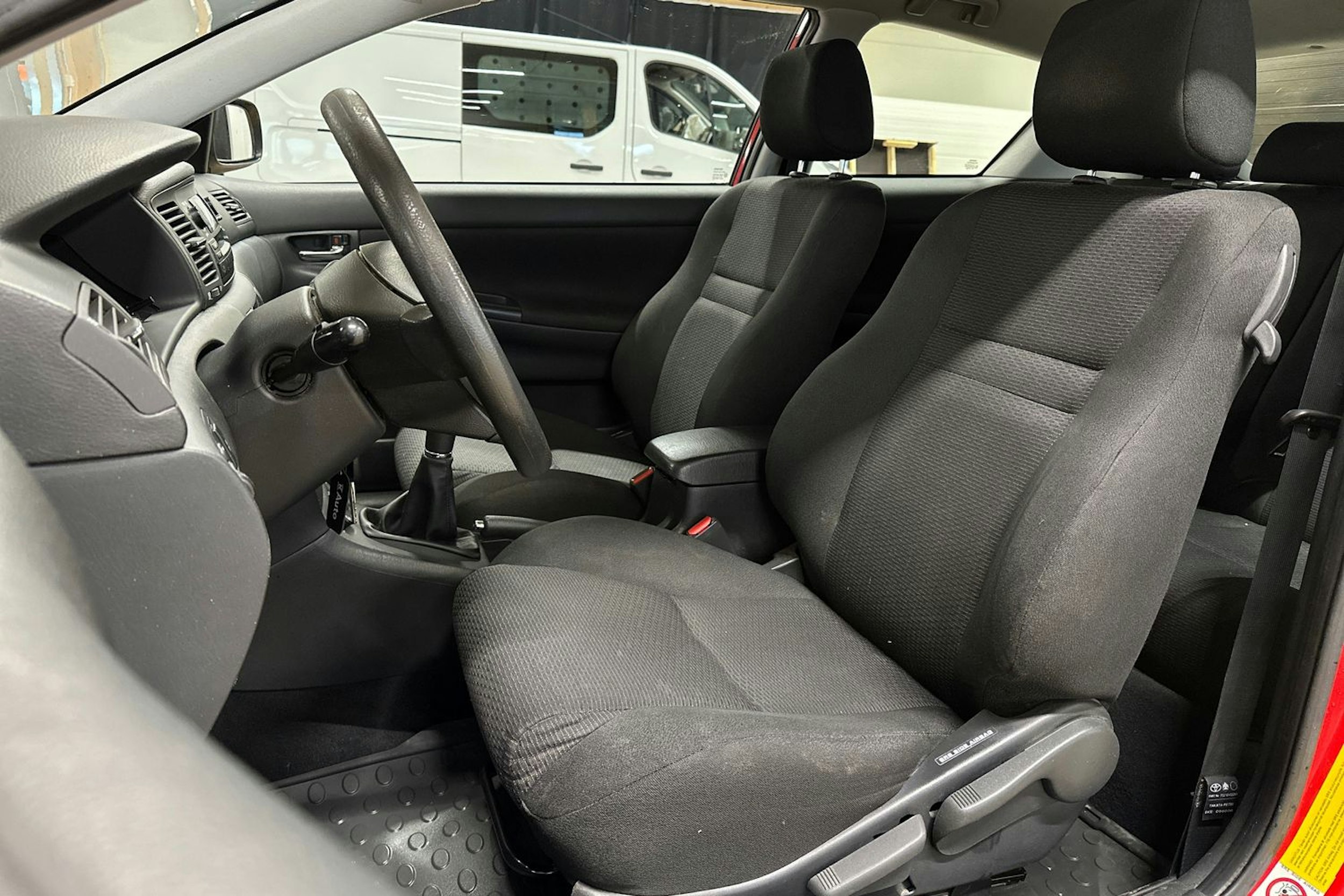 punainen Toyota Corolla 2006 kuva 14.