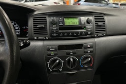 punainen Toyota Corolla 2006 kuva 15.