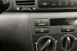 punainen Toyota Corolla 2006 kuva 16.