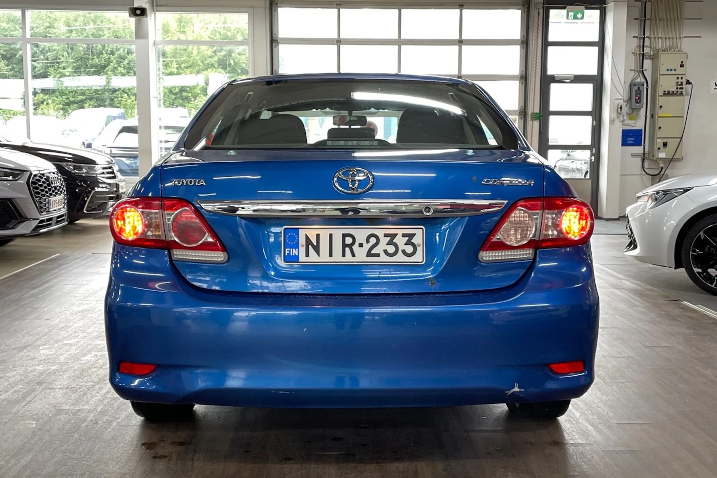 Sininen Toyota Corolla 2012 kuva 4.