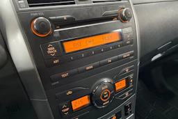 Sininen Toyota Corolla 2012 kuva 6.