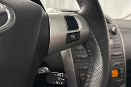 Sininen Toyota Corolla 2012 kuva 19.