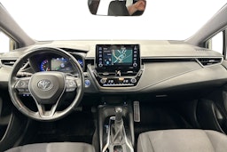 tummanvihreä metalli Toyota Corolla 2019 kuva 7.