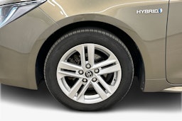 tummanvihreä metalli Toyota Corolla 2019 kuva 9.
