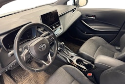 Valkoinen Toyota Corolla 2023 kuva 3.