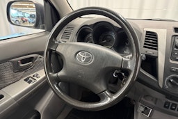 musta Toyota Hilux 2006 kuva 11.