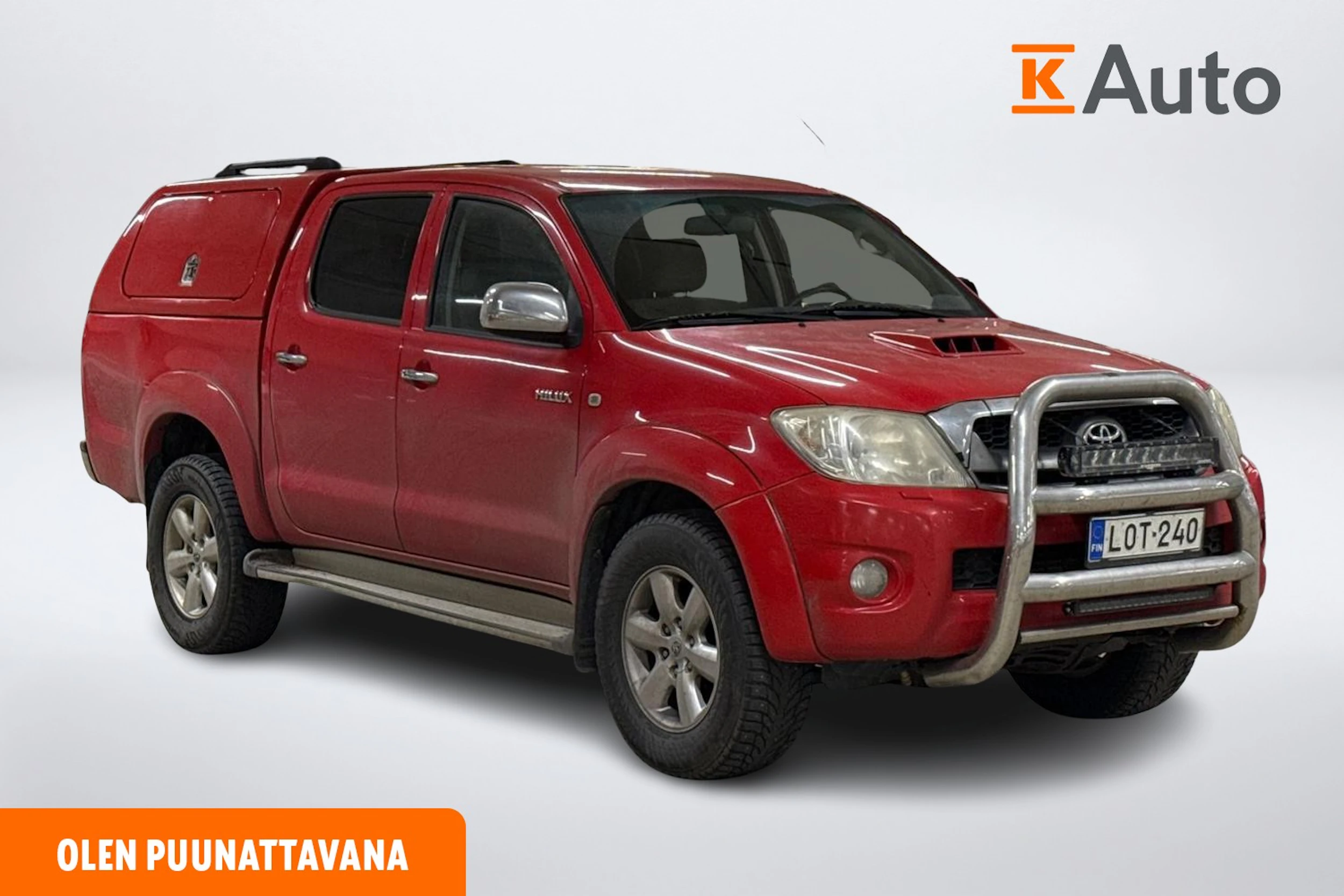 punainen Toyota Hilux 2009 kuva 1.